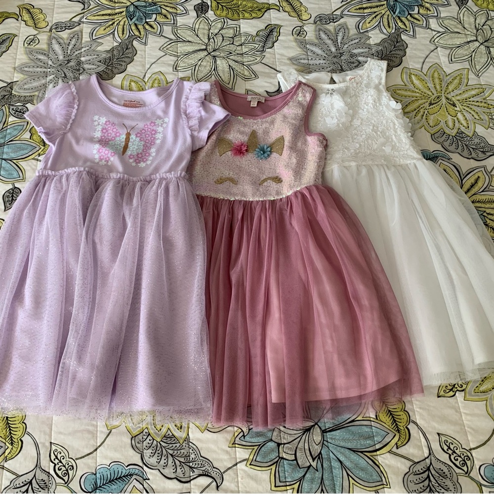Set of four size medium dresses